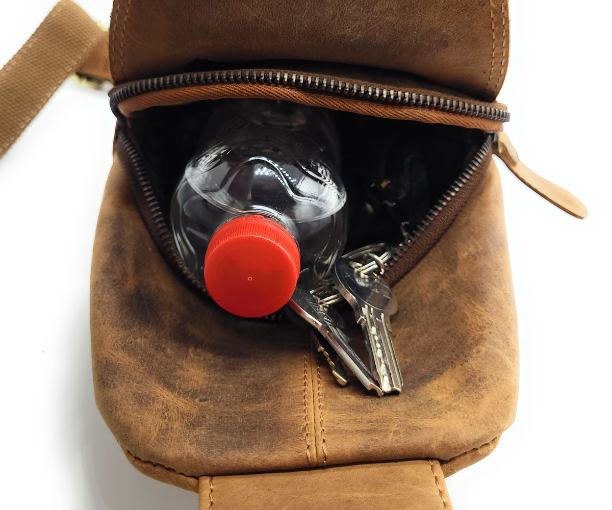 Leatherfox Slingbag aus Hunterleder – Echtleder Umhängetasche | Rechts & Links tragbar | 30x15x8 cm